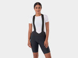 Trek Velocis Women's cycling bib shorts in breathable, eco-friendly performance gear with adjustable straps and padded seat.