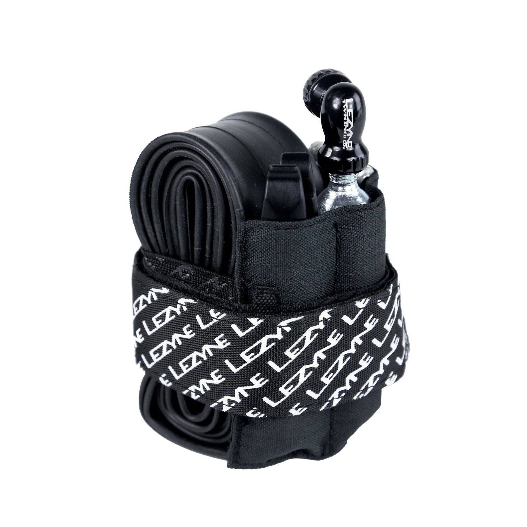 Lezyne Sendit Caddy bike seat pack organizer with cycling tools and accessories for convenient storage on bike saddle.