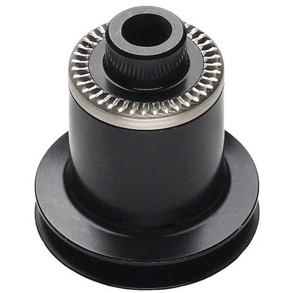 DT Swiss spacer shim 26/20 x 0.5 mm for bike hubs, shown installed on a wheel, ensuring proper spacing and smooth performance.