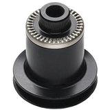 DT Swiss spacer shim 26/20 x 0.5 mm for bike hubs, shown installed on a wheel, ensuring proper spacing and smooth performance.
