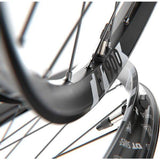 DT Swiss F 1900 29-inch rear mountain bike wheel with 30mm rim, 12x157mm axle, Shimano HG freehub, shown from side view