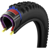 Vittoria Mostro Race 29x2.4 Enduro tubeless-ready folding mountain bike tire in full black, showing tread pattern and sidewall branding