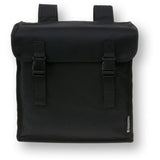 Basil Mara Double Bag 26L black water-repellent bike pannier with reflective accents attached to a bicycle rack.