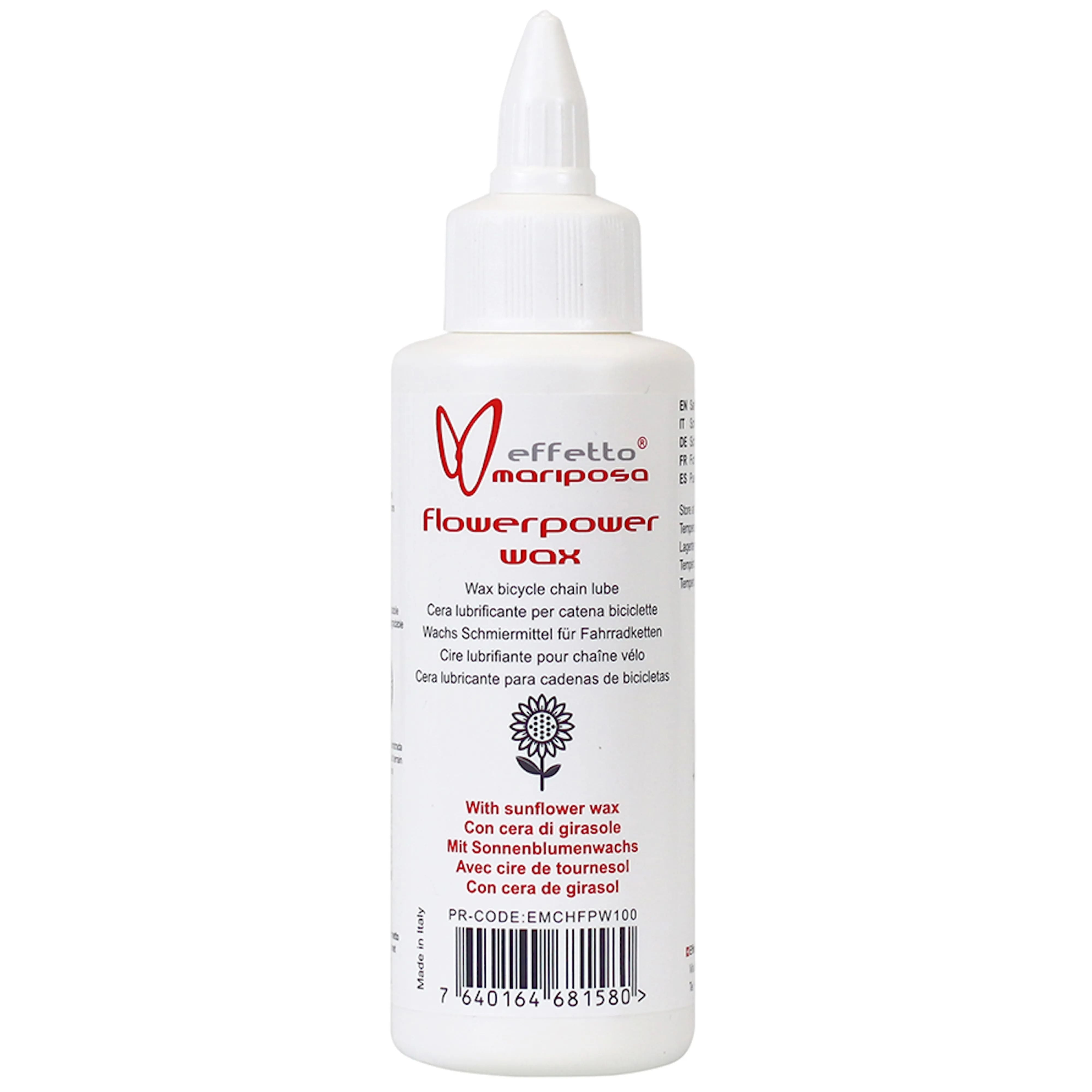 Effetto Mariposa Flowerpower Eco-Friendly Bicycle Chain Lube wax applied to a bike chain in a workshop setting.
