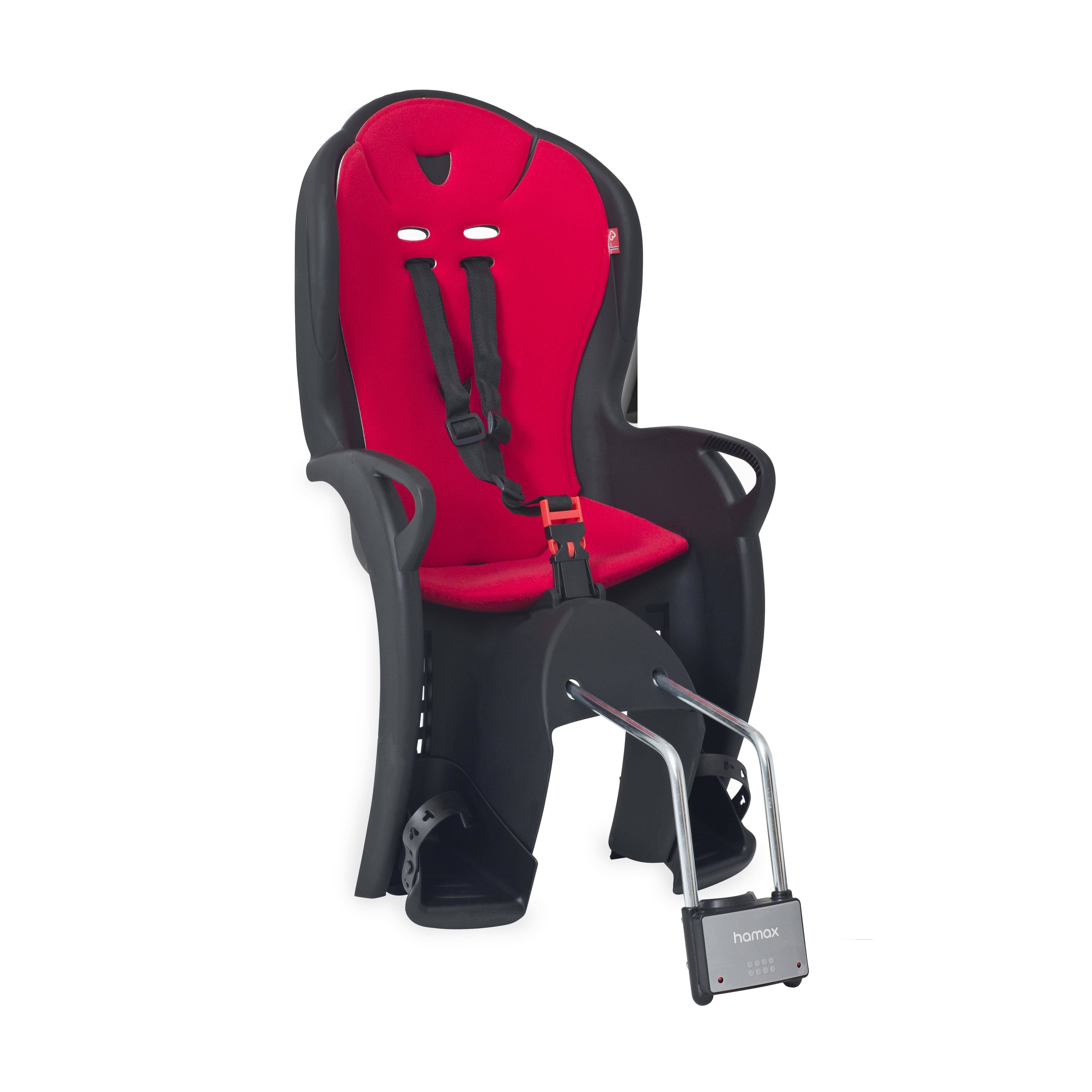 Hamax Kiss child bike seat in black and red with suspension and quick-release system, designed for safe cycling with kids.