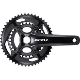 Shimano GRX FC-RX810 11-speed gravel chainset with 2-piece hollowTech II design, featuring crank arms and chainring for off-road cycling.