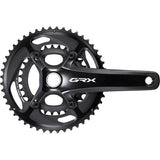 Shimano GRX FC-RX810 11-speed gravel chainset with 2-piece hollowTech II design, featuring crank arms and chainring for off-road cycling.