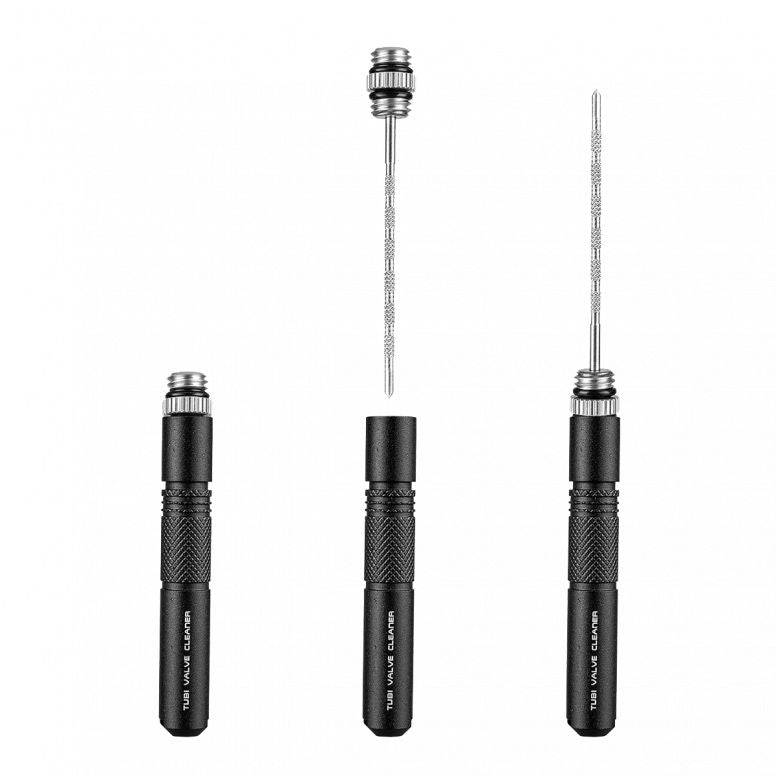 Topeak Tubi Valve Cleaner for tubeless Presta valves, compact black bike tool with cleaning brush and valve maintenance features.