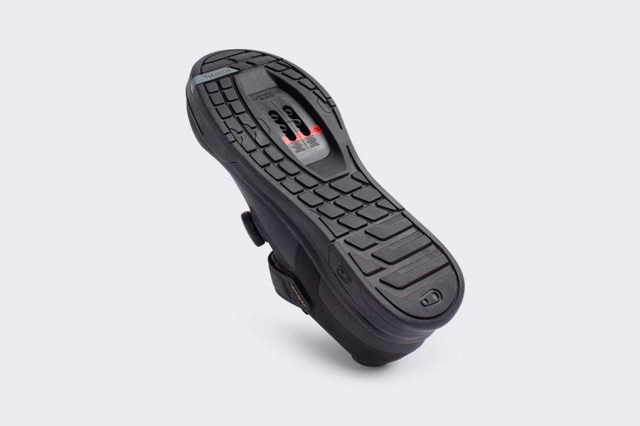 Crank Brothers Mallet BOA MTB shoes with Match Box sole for mountain biking, showing black and red cycling footwear on a trail.