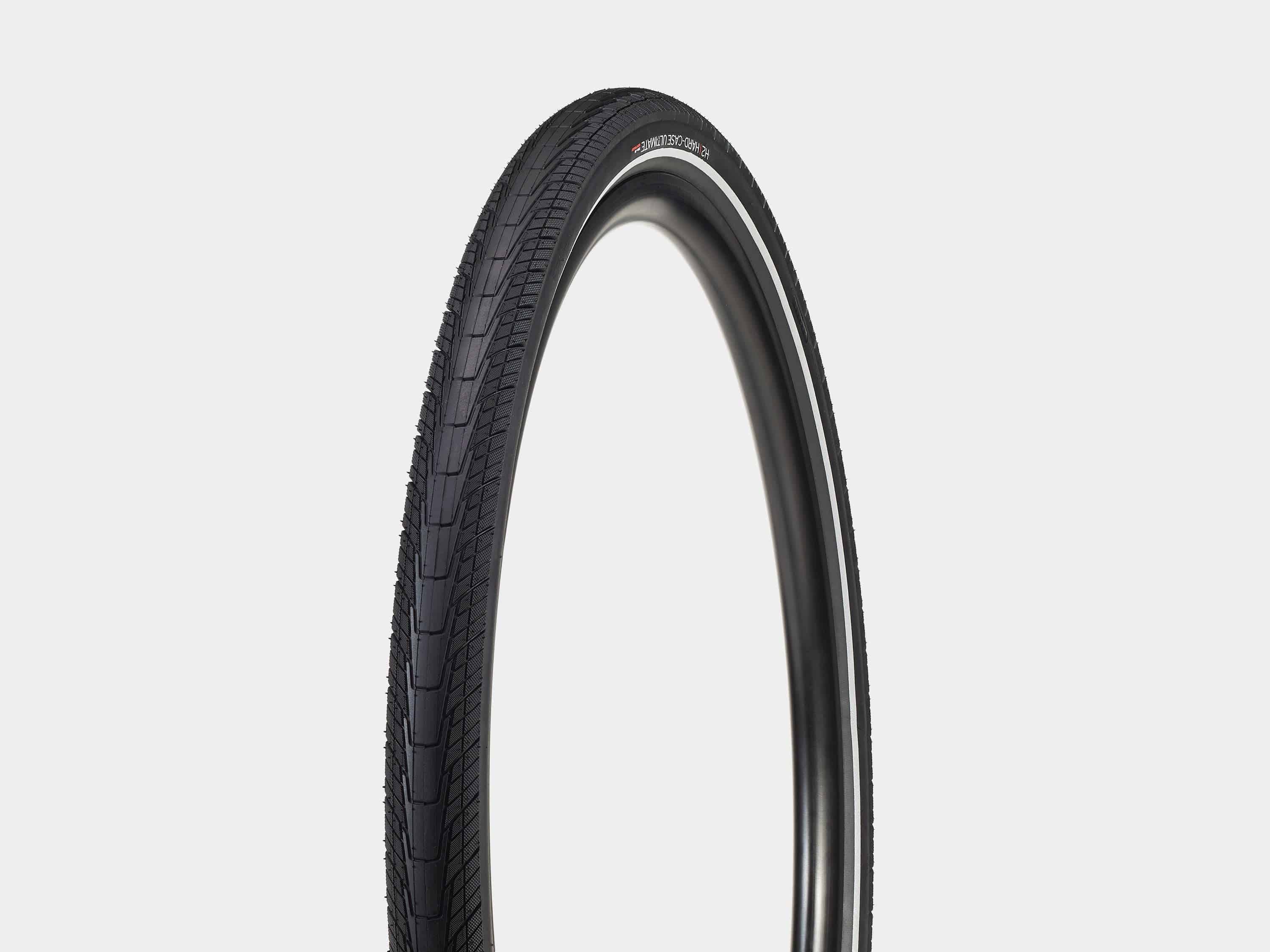 Bontrager H2 Hard-Case Ultimate bike tyre with puncture protection and reflective sidewalls, shown mounted on a bicycle wheel.