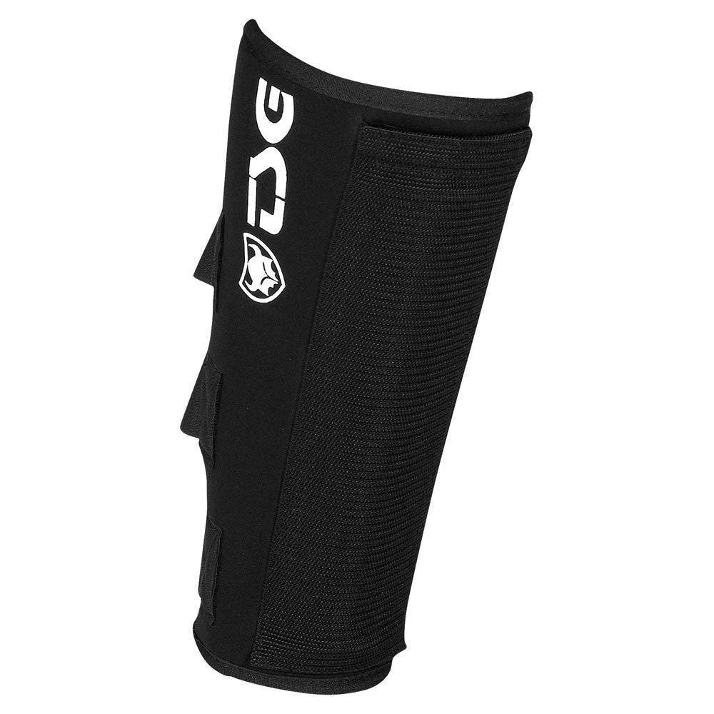 TSG BMX shinpads with removable protective splint and adjustable Velcro straps, designed for impact protection and a secure fit.