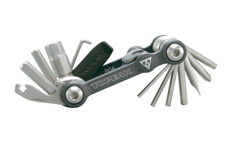 Topeak Mini 18 multi-tool set in black and silver for bike repair, featuring compact design and various repair tools.