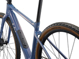 Liv Devote Advanced 2 MY26 women's gravel bike with lightweight frame, knobby tires, and drop handlebars for versatile riding.