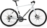 Merida Speeder 300 hybrid bike with hydraulic disc brakes and carbon fork, suitable for commuting and fitness riding.