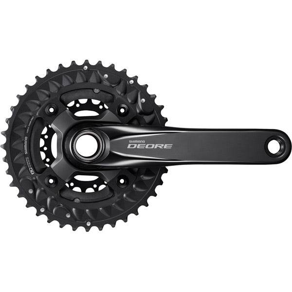 Shimano Deore FC-M6000 10-speed MTB chainset with hollowtech II design and 50mm chain line, mounted on a mountain bike.