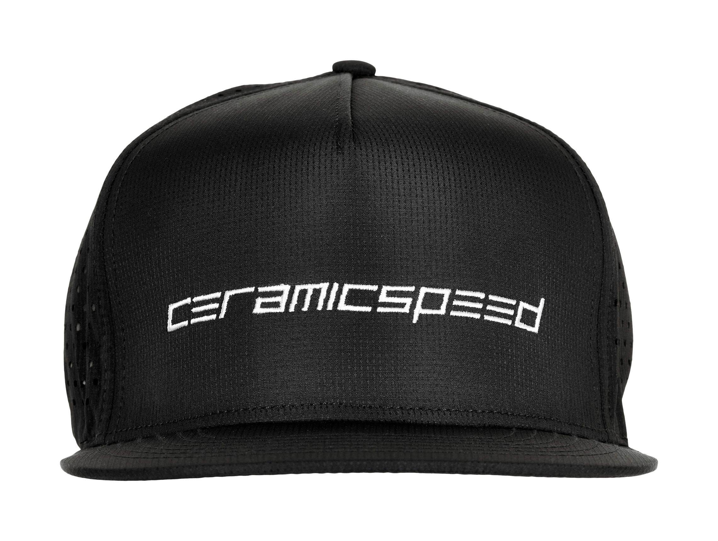 CeramicSpeed black flat brim cap with adjustable snapback, featuring a classic baseball style and branding on the front.