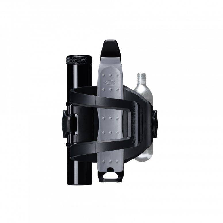 Crankbrothers BC18 SOS bottle cage tool kit with multi-tool in black and silver, designed for bike repairs and maintenance.