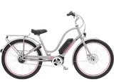 Electra Townie Go! 5i EQ electric hybrid bike with Bosch Active Line Plus motor, featuring step-thru frame and comfortable riding position.