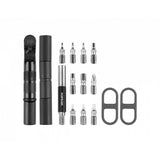 Topeak Ratchet N Roll Elite black compact bike repair tool kit with CO2 inflator for workshop use, including tools and inflator components.