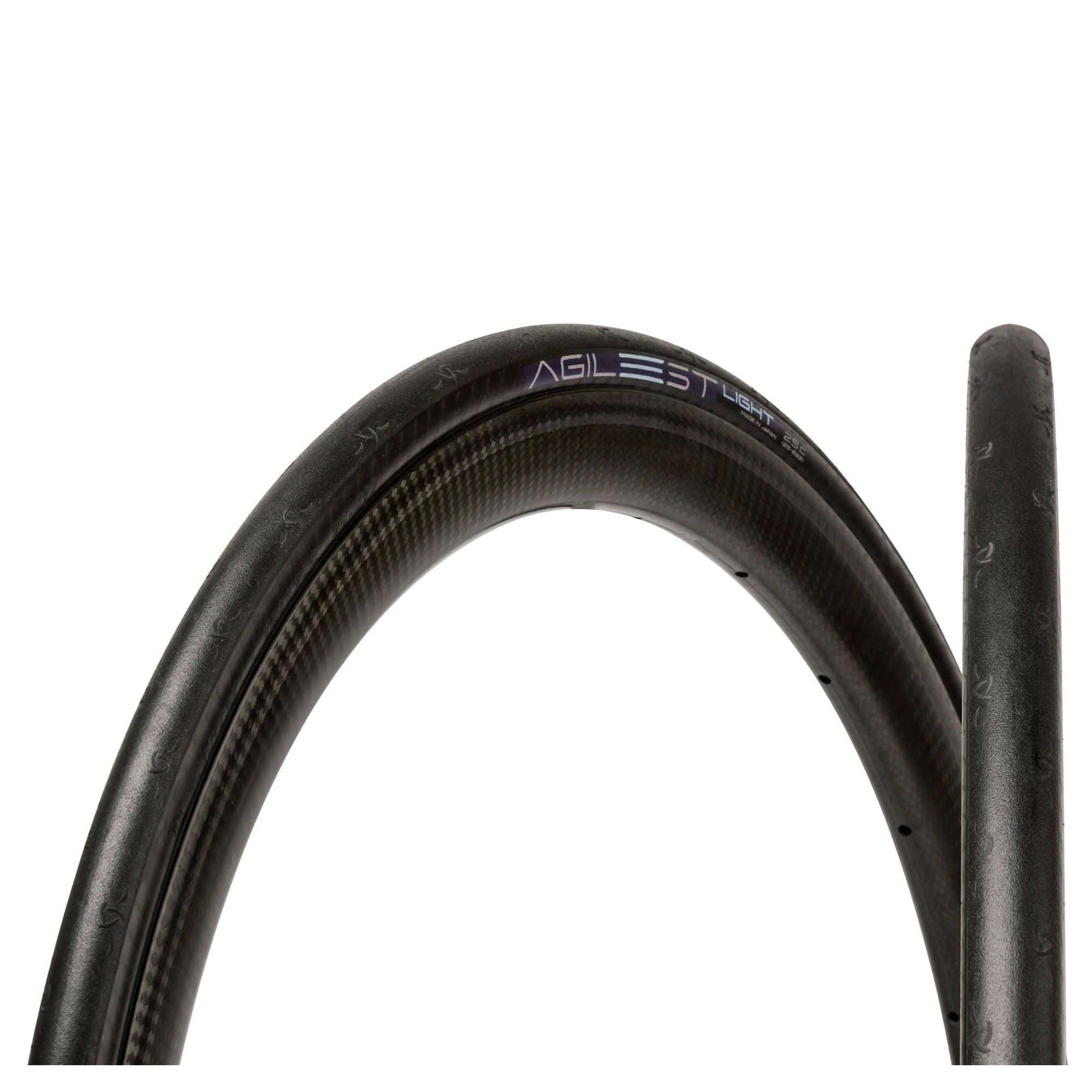 Panaracer Agilest Light folding road bike tire 700x25c, puncture-resistant racing bicycle component, close-up view of tread and sidewall