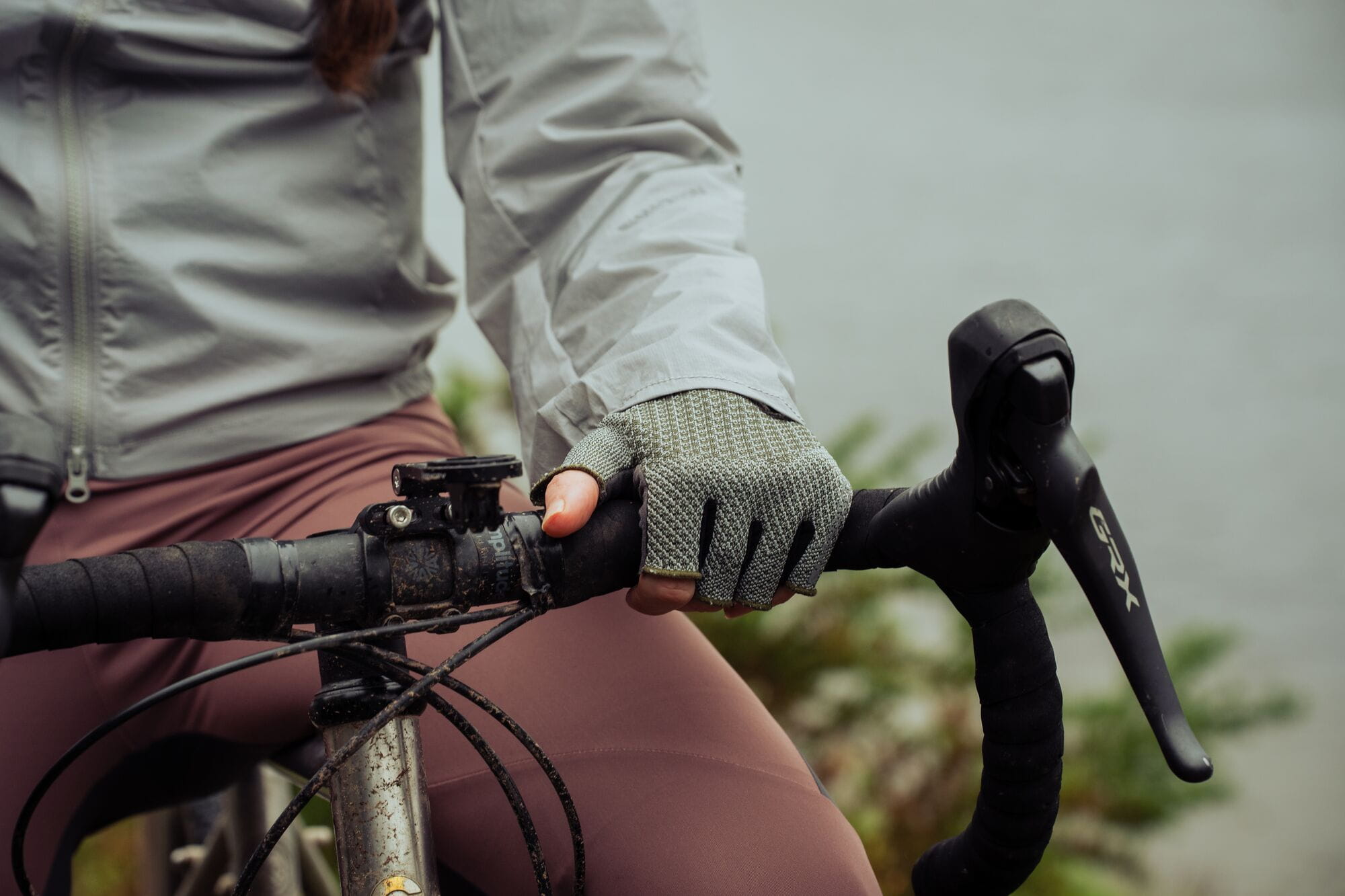 Madison Flux Ergonomix cycling gloves with touchscreen compatibility, featuring padded palms and breathable fabric for comfortable riding.