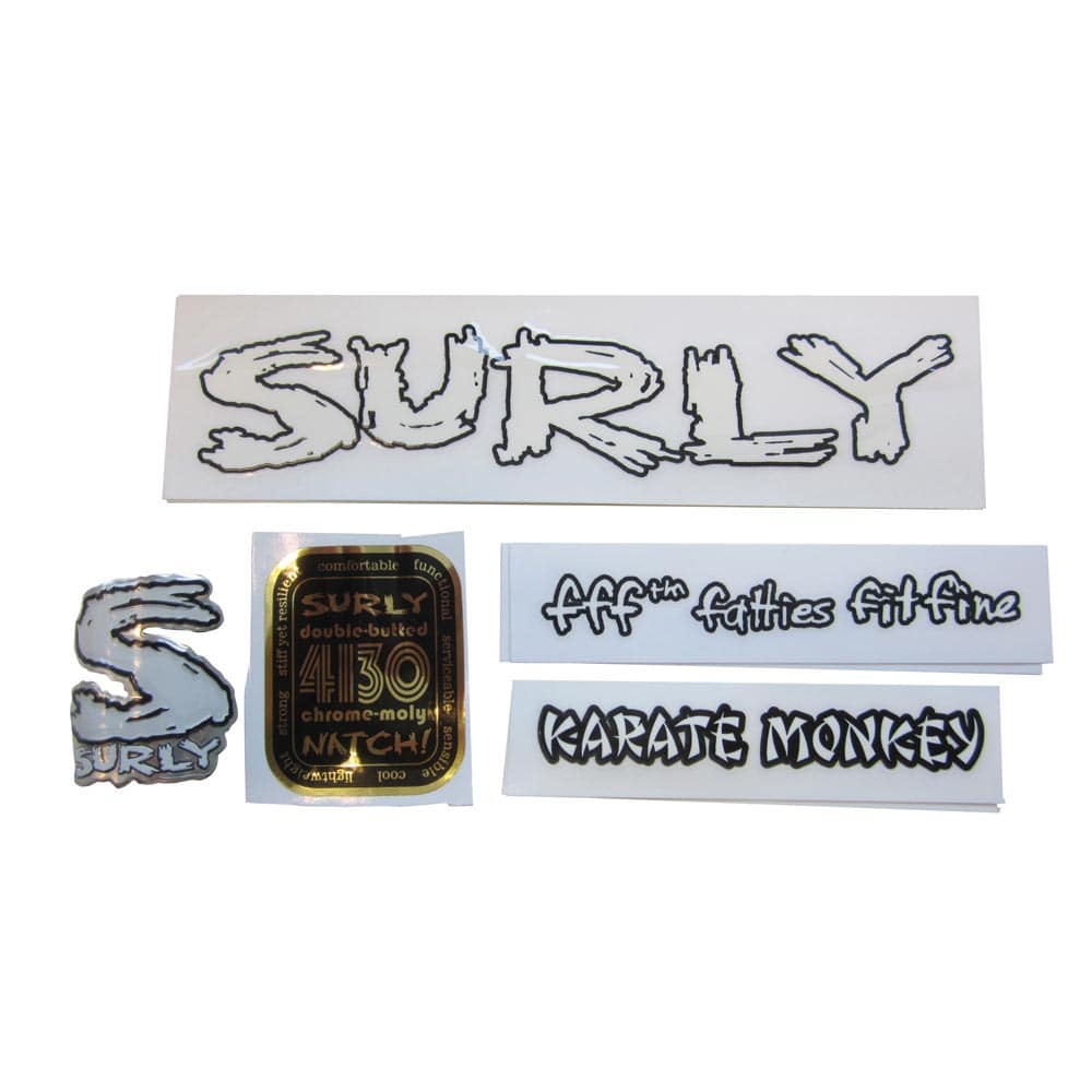 Surly bike frame decal kit with headbadge for customizing and restoration, featuring black and white decals on a bicycle frame.
