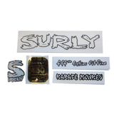 Surly bike frame decal kit with headbadge for customizing and restoration, featuring black and white decals on a bicycle frame.