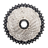 MicroSHIFT Sword H-Series 10-speed 11-38 cassette for standard freehub body, showcasing the metal gear teeth and black finish.