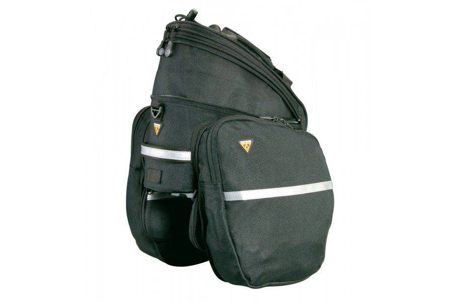 Topeak RX TrunkBag DXP black rear bike rack bag with expandable storage and QuickTrack mount on a bicycle.