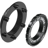 DT Swiss Centre-Lock to 6-Bolt adapter for MTB hubs with 15mm axles, showing the compact metal component for wheel compatibility.