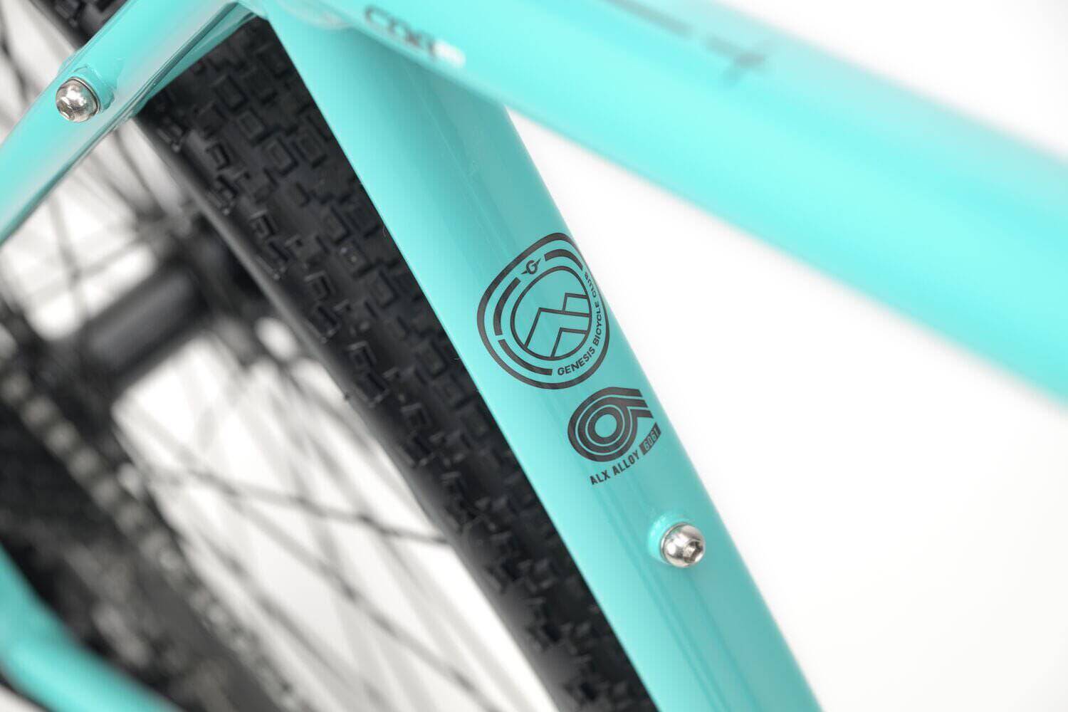 Genesis CDA 20 gravel bike with drop bars, 700c wheels, suitable for mixed terrain and commuting, detailed view of frame and components.
