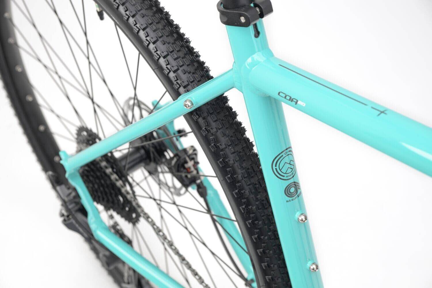 Genesis CDA 20 gravel bike with 700c wheels and drop bars, designed for mixed terrain and commuting.