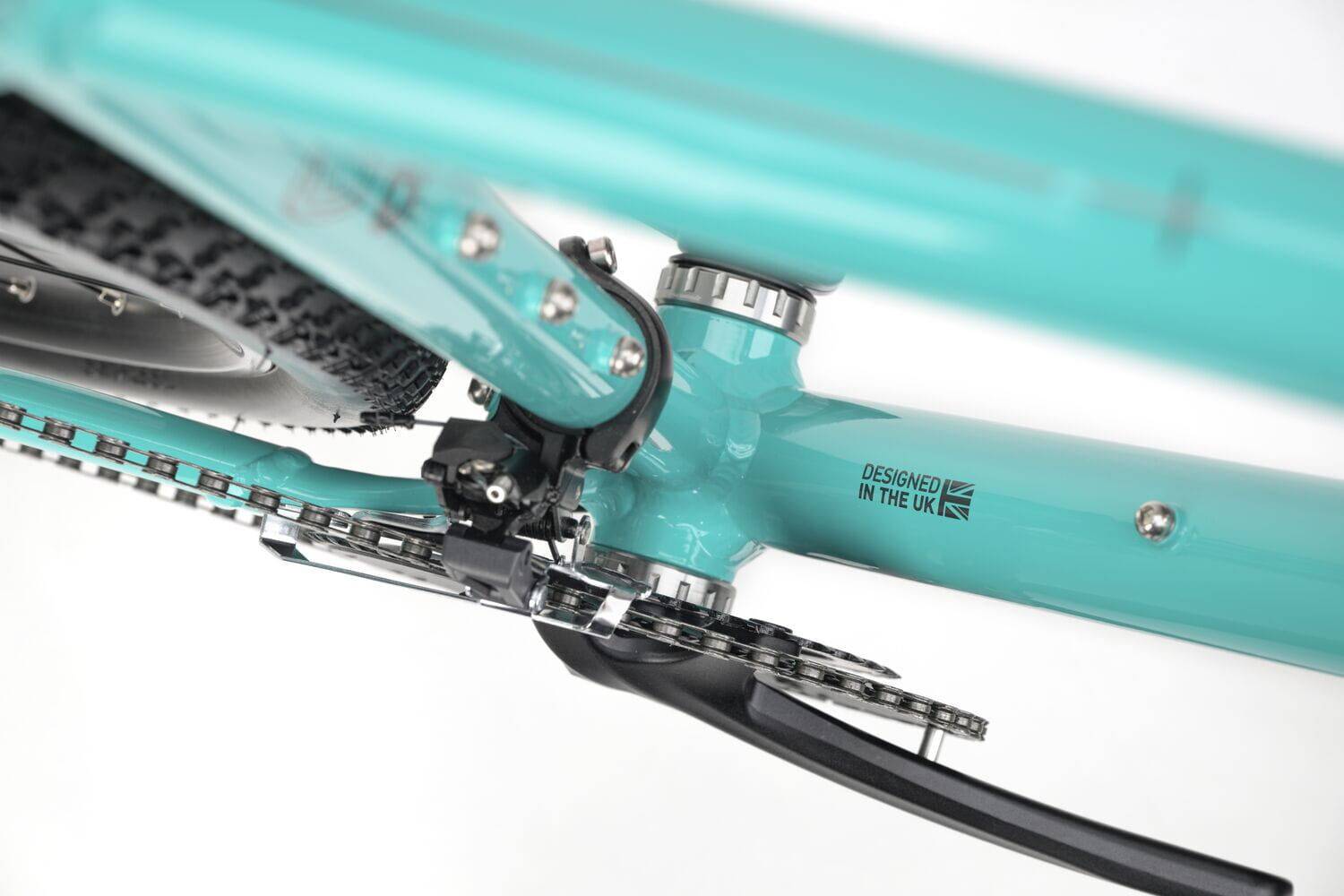 Genesis CDA 20 gravel bike with drop handlebars, 700c wheels, designed for mixed terrain and commuting.