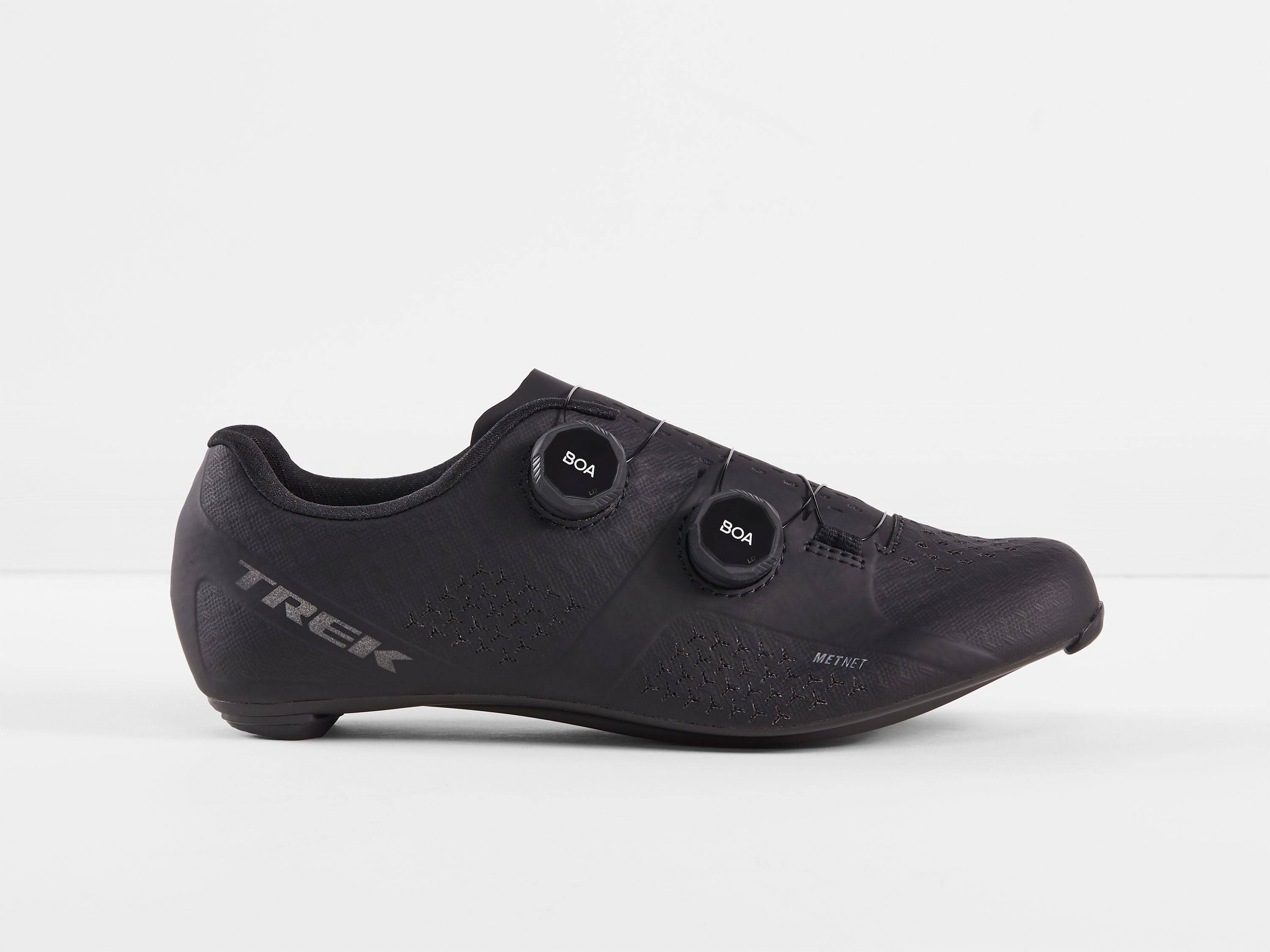 Trek Velocis unisex road cycling shoes in black, red, and white, EU sizes 36 to 48, shown with breathable mesh and secure straps.