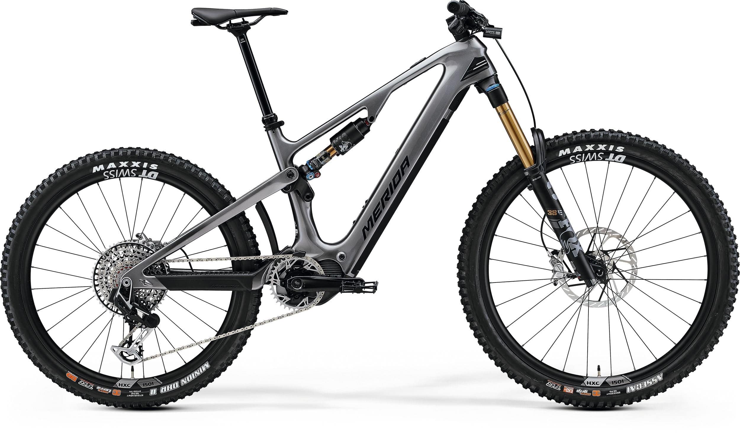 Merida eOne-Sixty 10K full carbon e-mountain bike with 600Wh battery and advanced suspension, shown on rugged trail terrain.