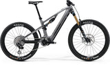 Merida eOne-Sixty 10K full carbon e-mountain bike with 600Wh battery and advanced suspension, shown on rugged trail terrain.