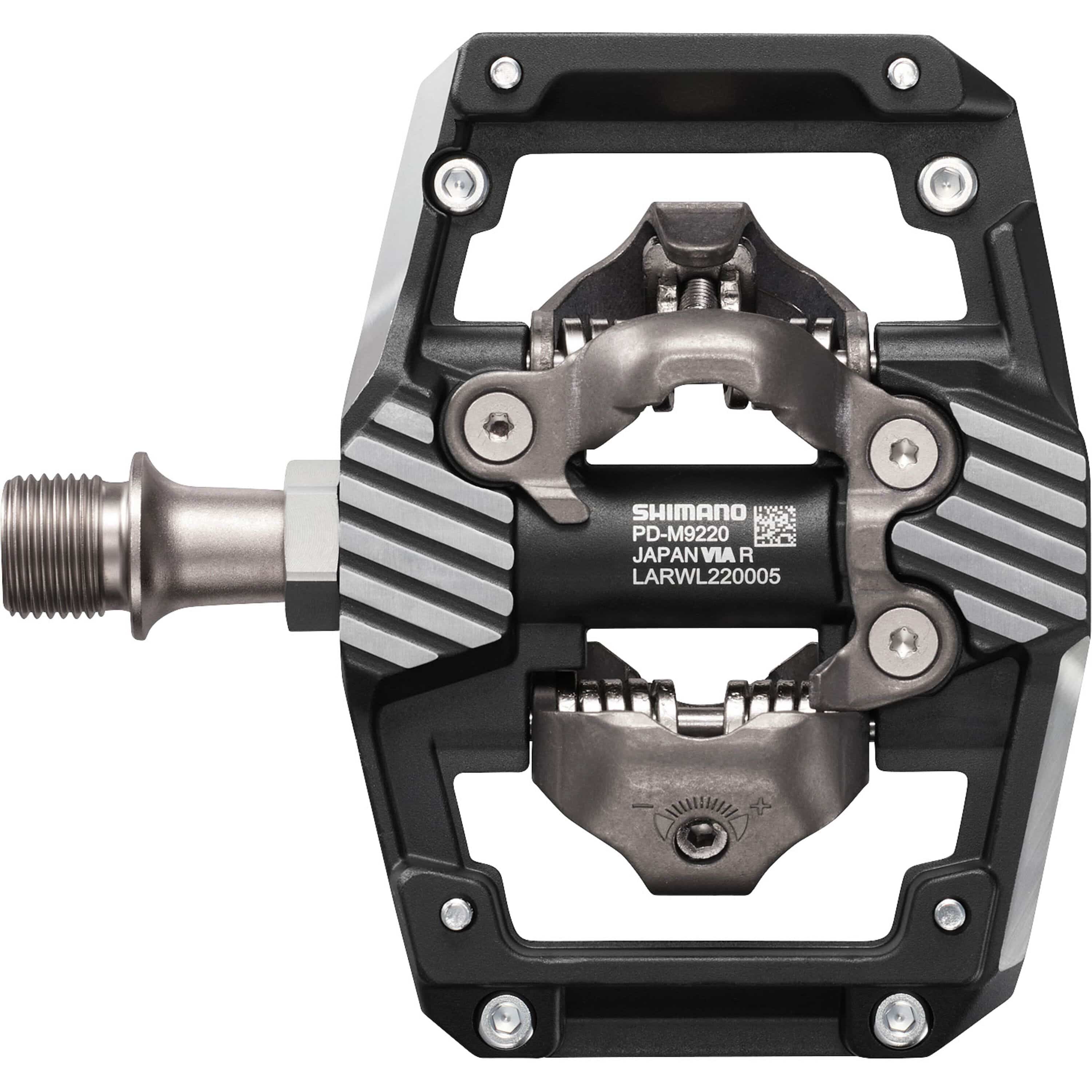 Shimano XTR PD-M9220 trail wide platform mountain biking pedals with cleats and durable metal construction.