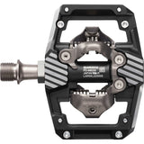 Shimano XTR PD-M9220 trail wide platform mountain biking pedals with cleats and durable metal construction.
