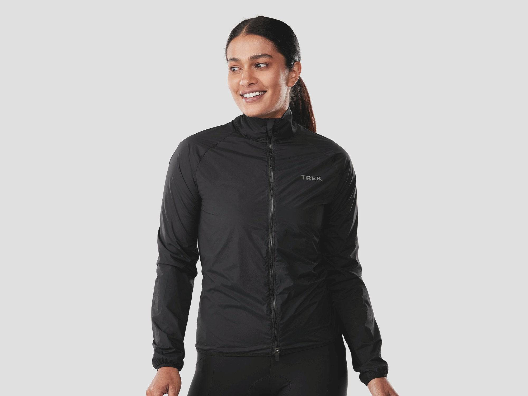 Trek Circuit Women's lightweight wind-resistant cycling jacket, packable and ideal for active outdoor riding.