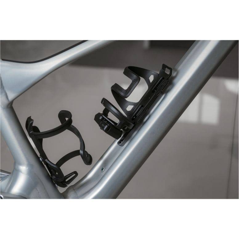 Topeak black CNC aluminum cage mount extender for bottle cages, adjustable and lightweight bike accessory.