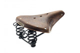 Brooks B67 Softened Tan Leather Saddle for comfortable urban riding, featuring classic design and sturdy leather construction.