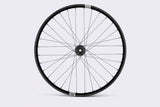 Crankbrothers Synthesis Alloy Enduro MTB rear wheel with 32 spokes and i9 hub, designed for durable mountain biking performance.