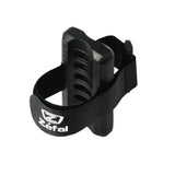 Zefal universal bike pump clip mount attached securely to a bike frame for easy access and transportation of a bicycle pump.