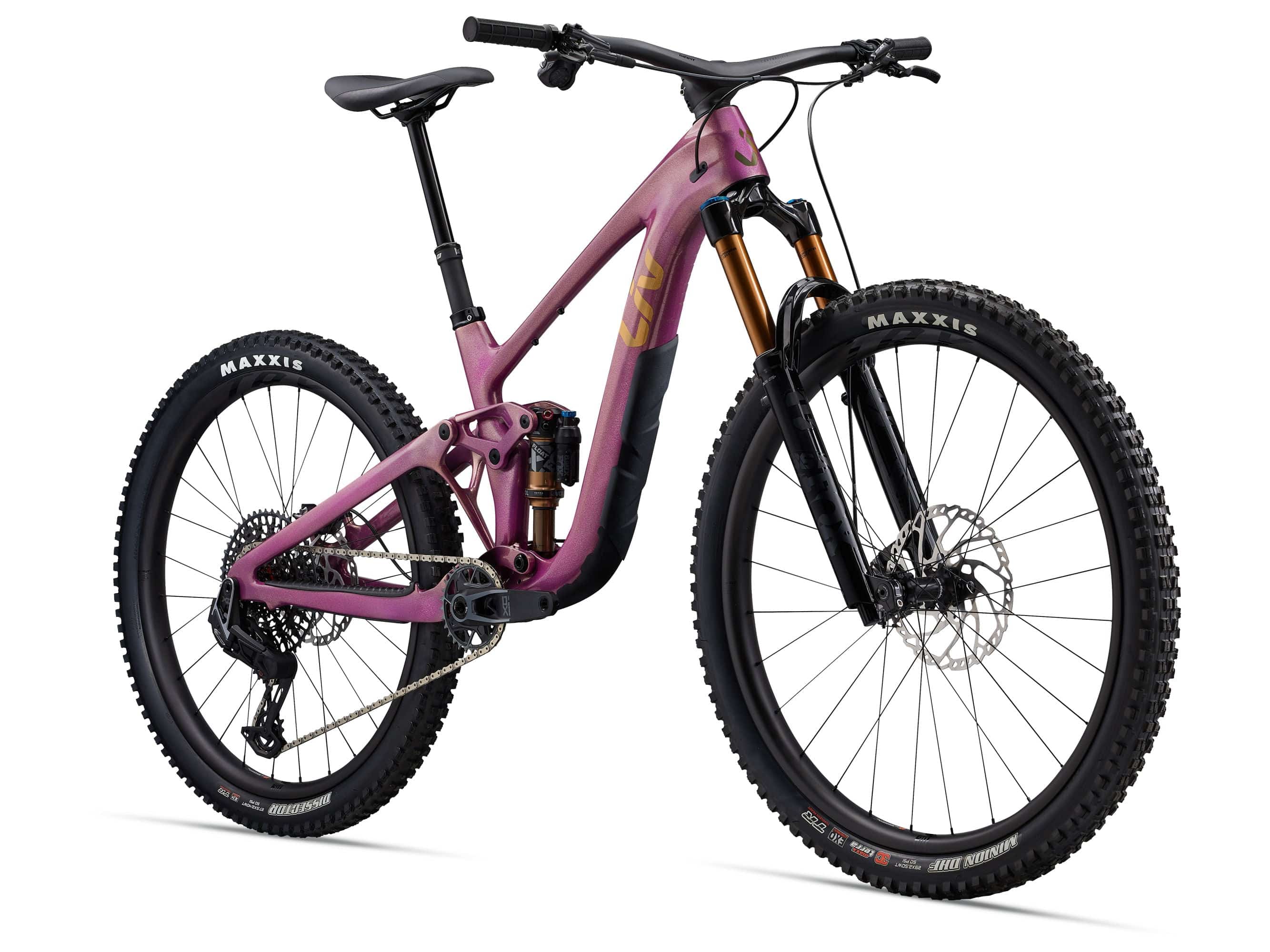 Liv Intrigue X Advanced 0 mountain bike with adjustable geometry and suspension system, shown in a rugged outdoor setting.