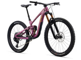 Liv Intrigue X Advanced 0 mountain bike with adjustable geometry and suspension system, shown in a rugged outdoor setting.