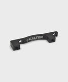 Galfer bike radial caliper adapter for postmount frames, used for brake upgrades on bicycle components.