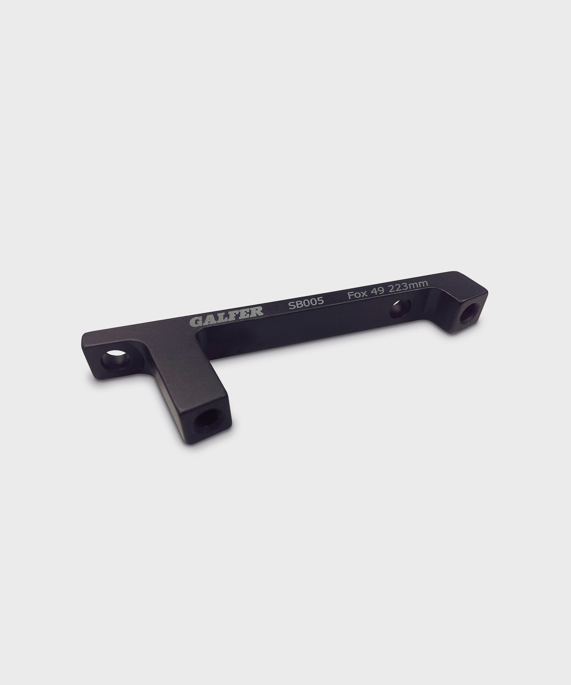 Galfer FOX 40/49 fork postmount caliper adapter for motorcycle brakes, shown mounted on brake components.