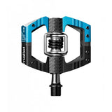 Crankbrothers Mallet E LS clipless enduro pedal with adjustable float and axle options, showing the pedal's rugged design and cleat interface.