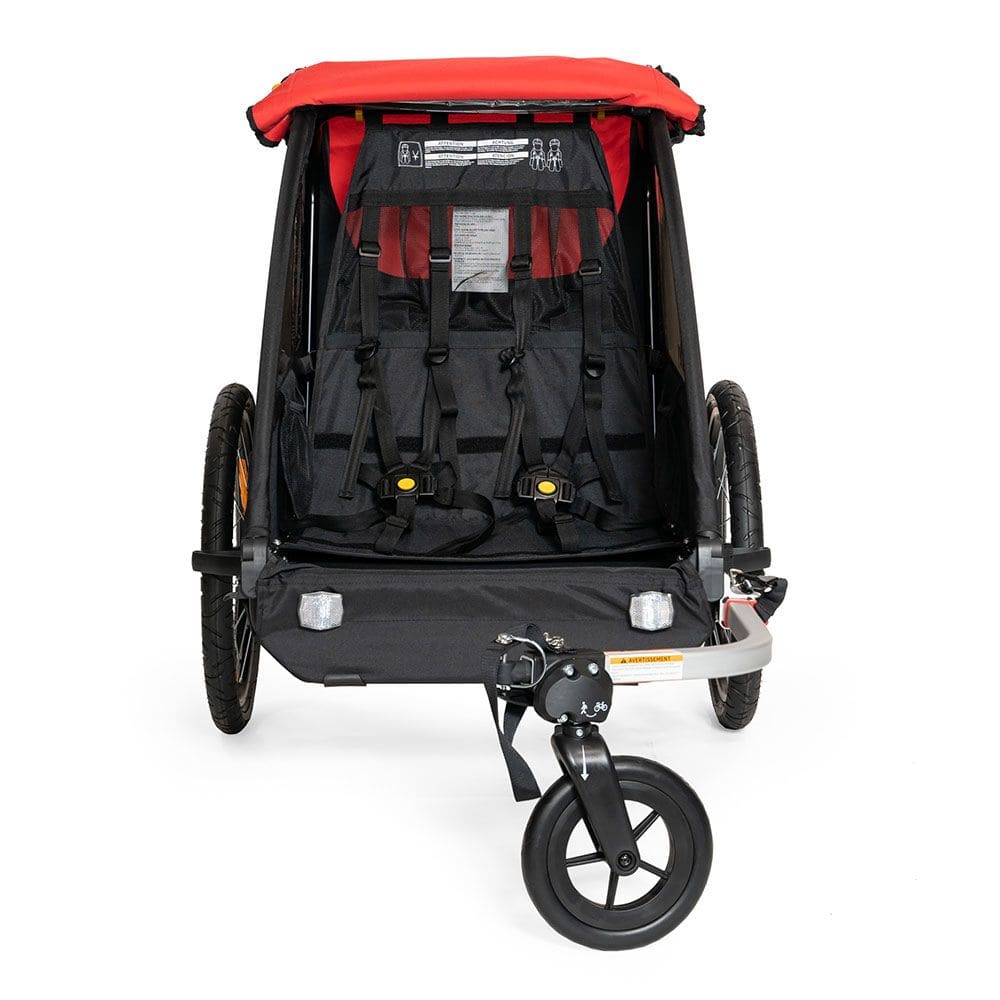 Burley Honey Bee 2024 bike trailer and stroller with one-wheel kit for two children, featuring a sleek design and safety features.