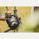 Aeroe 12L waterproof dry bag for bike packing showing durable waterproof material and quick release system, accessories for cycling.